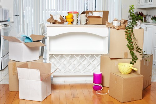 Professional removal team handling household items in South Kensington