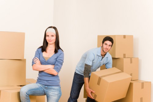 Family preparing belongings for mobile self storage in South Kensington